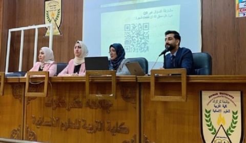 A scientific seminar at the University of Kirkuk on the effectiveness of volunteer work in the university environment