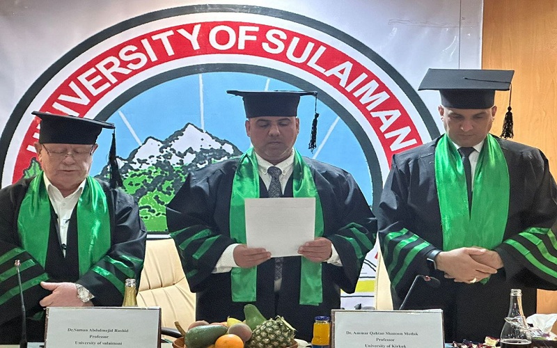 A lecturer at the College of Agriculture heads a committee discussing a master’s thesis at Sulaymaniyah University.