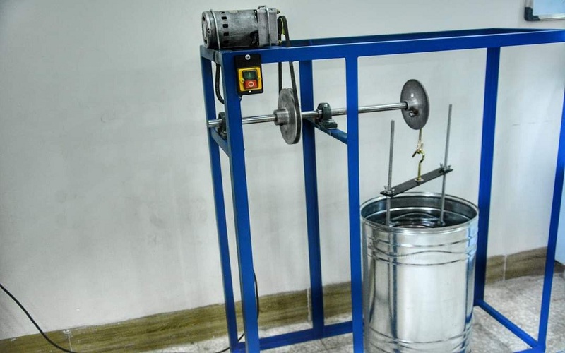 Professor Dr. Dilshad Rasul Aziz, manufactures a soil aggregate stability measurement device.