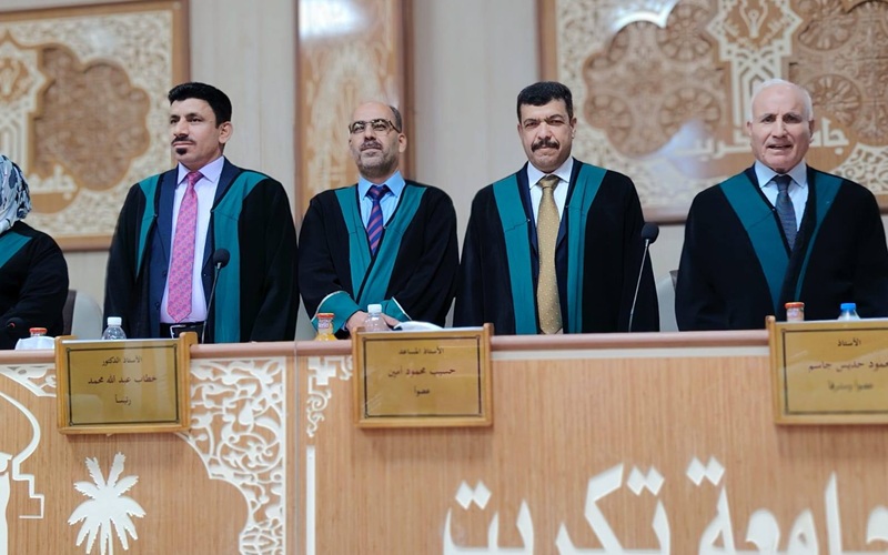 تدريسي من جامعة كركوك يترأس لجنة مناقشة رسالة ماجستير في جامعة تكريت.
