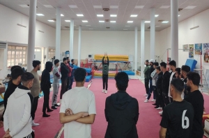 كلية التربية البدنية تنظم ورشة عمل عن اساسيات الجمناستك