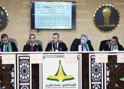 معاون العميد للشؤون العلمية في كلية التربية الأساسية تشارك في مناقشة اطروحة دكتوراه في كلية القانون – جامعة تكريت