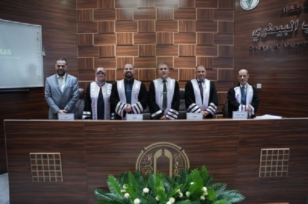 A faculty member from the University of Kirkuk heads a committee to discuss a master's thesis at the University of Baghdad