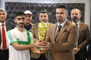 To encourage University sports, the President of University of Kirkuk honors the five players football championship-winning team