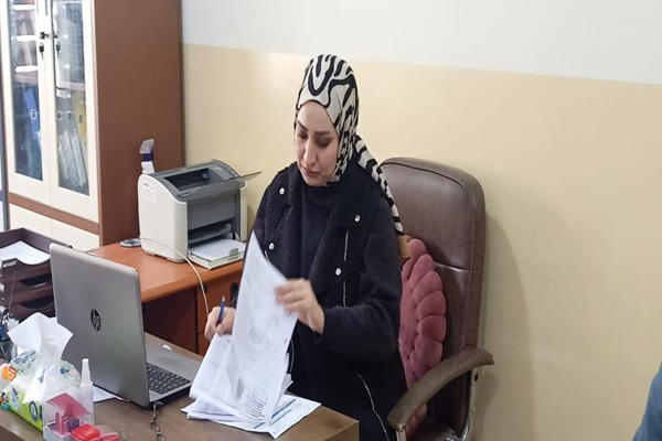 لجنة من قسم التسجيل في ...