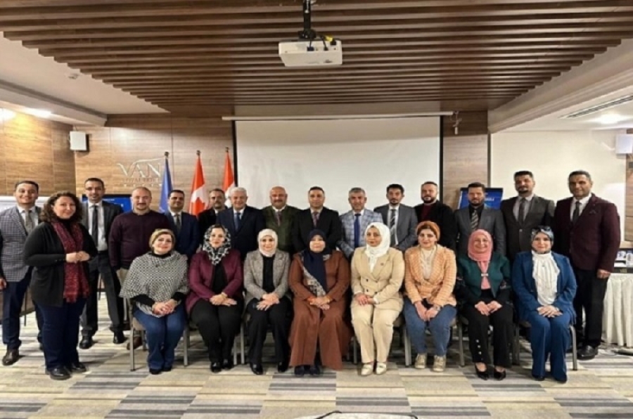 A faculty member from the University of Kirkuk participates in a workshop on education and its role in spreading peace