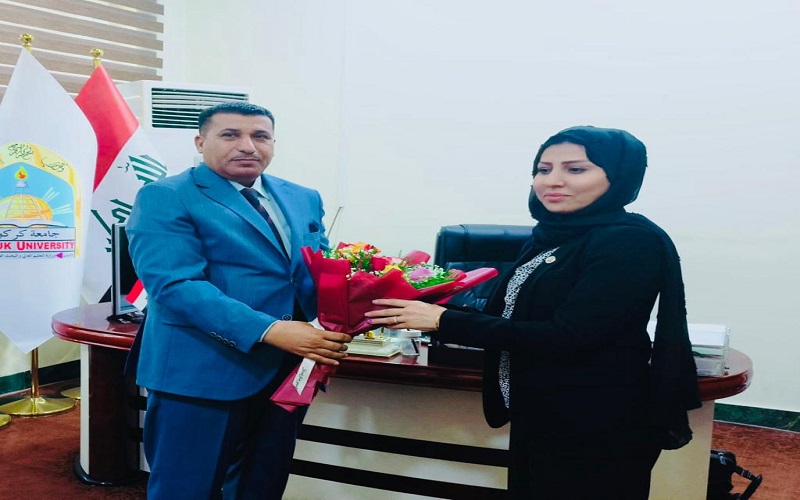 تهنئة السيد عميد كلية العلوم/ جامعة كركوك للاستاذ المساعد ايمان عبد الواحد مجيد بمناسبة تسمنها المنصب الجديد