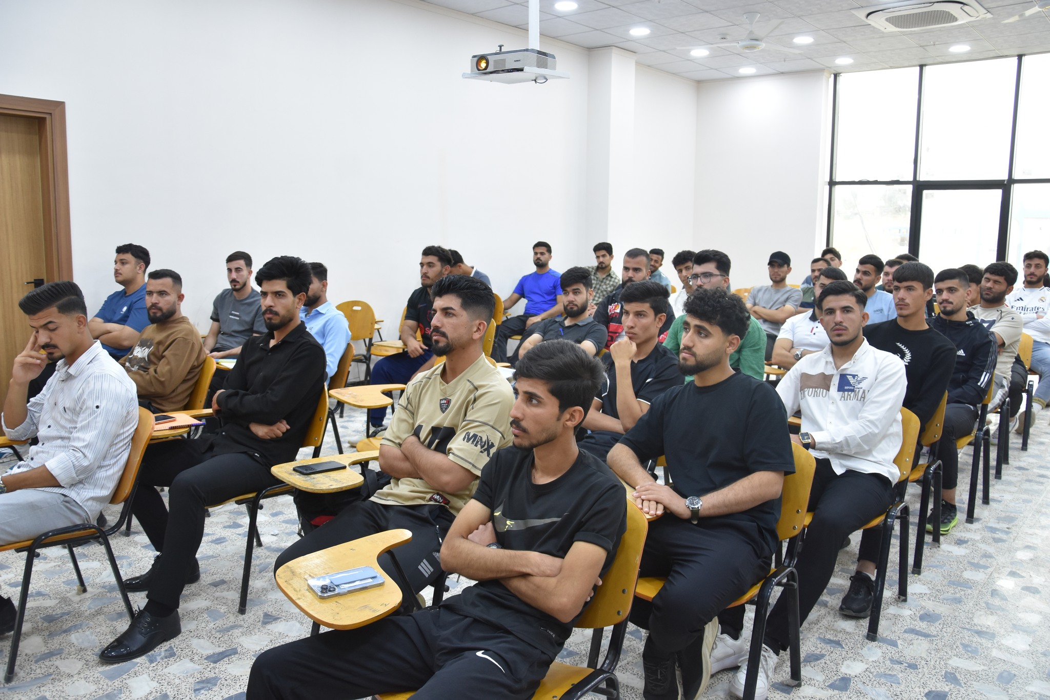 كلية التربية البدنية وعلوم الرياضة تنظم ورشة عمل توعوية عن التمارين التعليمية لمهارات الكرة الطائرة