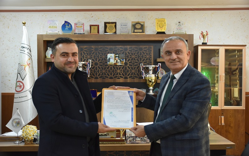 عمادة كلية التربية البدنية وعلوم الرياضة  تبارك تدريسيي لحصوله على الترقية العلمية
