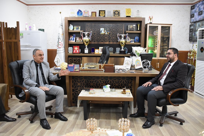 The Dean of the College of Physical Education and Sports Sciences receives a delegation from the Talented and Creative Syndicate in Kirkuk