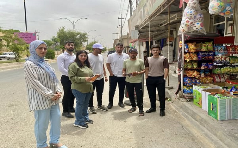 Veterinary students distribute brochures on human trafficking. 